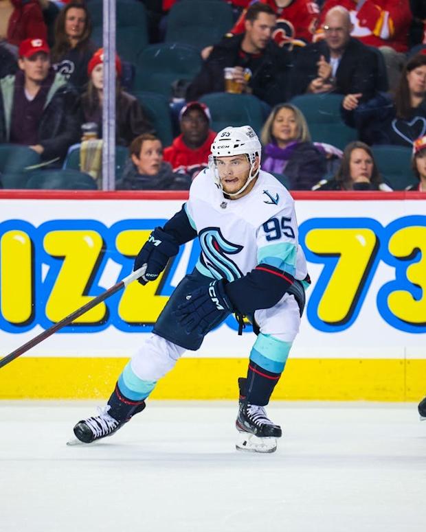Nov 1, 2022; Calgary, Alberta, CAN; Seattle Kraken left wing Andre Burakovsky (95) controls the puck against the Calgary Flames during the second period at Scotiabank Saddledome. Mandatory Credit: Sergei Belski-USA TODAY Sports